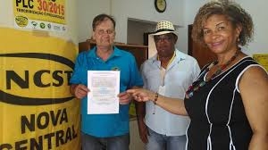 Ronei de Lima, presidente da Nova Central Sindical de Trabalhadores de Mato Grosso, ao lado de membros de sua diretoria.