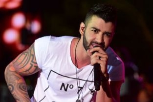 Cantor deixou o palco aps ouvir os disparos