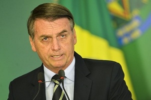 O presidente Jair Bolsonaro citou referendo de 2005, que rejeitou a proibição do comércio de armas de fogo, para justificar a necessidade de decreto que flexibizou a posse de armas no país. - Marcelo Camargo/Agência Brasil