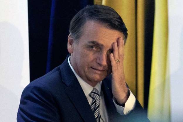 © SERGIO LIMA (AFP) Presidente Jair Bolsonaro, durante a posse do novo presidente da Frente Parlamentar da Agricultura, Alceu Moreira.