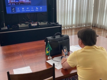 O presidente da República, Jair Bolsonaro e o presidente do Banco Nacional de Desenvolvimento Econômico e Social (BNDES), Gustavo Montezano, por videoconferência