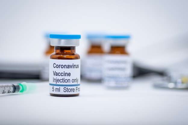 © Manjurul/istock Illustrative vial of coronavirus vaccine