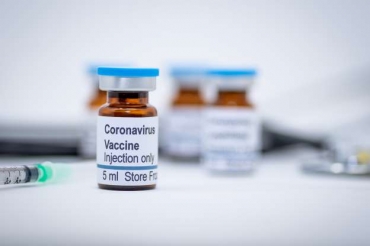  Manjurul/istock Illustrative vial of coronavirus vaccine